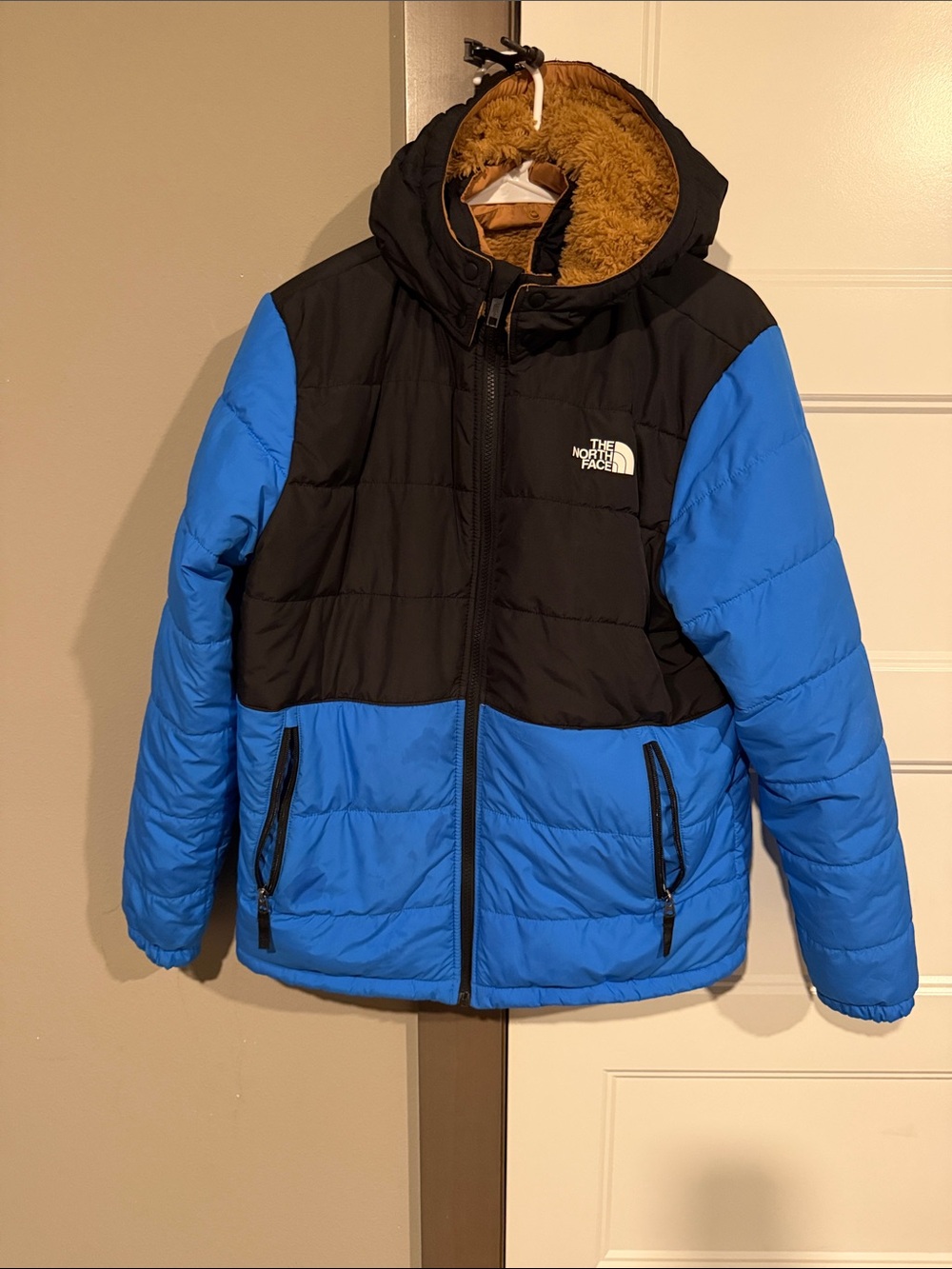 The North Face Reversible Black and Blue Kids Hooded Puffer Jacket